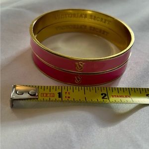 Victoria’s Secret hard bangles in two shades of pink. Gently worn.